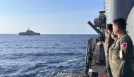 File photo: The USS Gabrielle Giffords receives passing honours by Philippine Navy Officers aboard BRP Gregorio Del Pilar during the 3rd AFP-USINDOPACOM Maritime Cooperative Activity in the disputed South China Sea. (Photo by Handout / Armed Forces of the Philippines' Western Command / AFP)