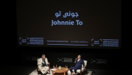 Johnnie To (right) addressing audiences at the Masterclass at Qumra.