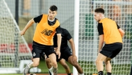 Al Sadd's Rafa Mujica (left) and Mostafa Mashaal during a training session.