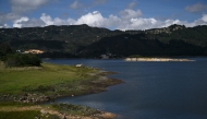 A view of the San Rafael Reservoir, a dam that is part of the Chingaza system, which supplies 70% of the water used in Bogotá, in the municipality of La Calera, Cundinamarca department, Colombia, on April 3, 2025. Photo by Raul ARBOLEDA / AFP.