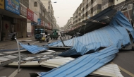 The remains of a metal structure are seen after it was blown over by high winds in Fuyang, in China's eastern Anhui province on April 12, 2025. (Photo by AFP) 
 
