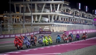 Riders compete during the MotoGP Qatar Grand Prix at the Lusail International Circuit yesterday.