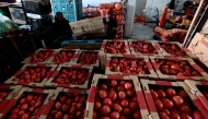 (FILES) Boxes of tomatoes are seen at the Central de Abastos market in Guadalajara, Jalisco state, Mexico on January 31, 2025. (Photo by ULISES RUIZ / AFP)
