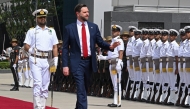 US Vice President JD Vance (C) inspects a guard of honour upon his arrival at the airport in New Delhi on April 21, 2025. (Photo by Kenny HOLSTON / POOL / AFP)