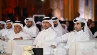 Minister of Justice and Minister of State for Cabinet Affairs H E Ibrahim bin Ali Al Mohannadi and other officials during the event yesterday.