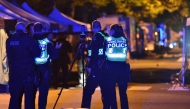Vancouver police investigate a crime scene after a man drove into pedestrians at the annual Lapu Lapu festival celebrating Filipino culture, at East 43rd Avenue and Fraser, in the south of Vancouver on April 26, 2025. (Photo by Don MacKinnon / AFP)