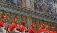 This handout picture released by the Press office shows cardinals chanting the Latin hymn 