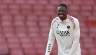 Paris Saint-Germain's French forward #10 Ousmane Dembele smiles during a training session at the Emirates Stadium in London, on April 28, 2025, on the eve of their UEFA Champions League semi-final first leg football match against Arsenal. (Photo by Franck Fife / AFP)