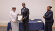 US Ambassador to Qatar H E Timmy Davis presenting a certificate of appreciation to CEO of Heart Hospital Dr. Nidal Asaad. 