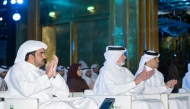 QOC President H E Sheikh Joaan bin Hamad Al-Thani, First Vice President Mohammed bin Yousef Al Mana and Secretary General Jassim bin Rashid Al Buenain applaud during the ceremony.