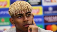 Barcelona's Spanish forward Lamine Yamal addresses a press conference on the eve of the UEFA Champions League semi-final first leg football match between FC Barcelona and Inter Milan at the Joan Gamper training ground in Sant Joan Despi, near Barcelona, on April 29, 2025. (Photo by LLUIS GENE / AFP)