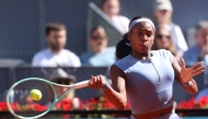 USA's Coco Gauff returns the ball to Poland's Iga Swiatek during their 2025 WTA Tour Madrid Open tennis tournament semi-final singles match at the Caja Magica in Madrid, on May 1, 2025. (Photo by Pierre-Philippe Marcou / AFP)