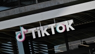The TikTok logo is seen outside the Chinese video app compan's Los Angeles offices in Culver City, California, on April 4, 2025. Photo by Robyn Beck / AFP