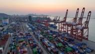 Containers are seen at the port in Lianyungang, in China’s eastern Jiangsu province on May 1, 2025. China said on May 2 it is evaluating a US offer for negotiations on tariffs but insisted Washington must be ready to scrap levies that have roiled global markets and supply chains before talks can begin. (Photo by AFP) 