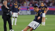 Inter Milan's Argentine forward #10 Lautaro Martinez warms up before the UEFA Champions League semi final first leg football match between FC Barcelona and Inter Milan at the Estadi Olimpic Lluis Companys in Barcelona on April 30, 2025. (Photo by LLUIS GENE / AFP)
