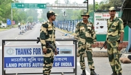 Indian Border Security Force (BSF) personnel stand guard near the India-Pakistan Wagah border post, about 35kms from Amritsar on May 5, 2025. (Photo by Narinder NANU / AFP)
