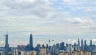 A general view of the Kuala Lumpur skyline on May 5, 2025, showing the Petronas Twin Towers (3rd R), Kuala Lumpur Tower (C), Tun Razak Exchange (2nd L) and Menara Merdeka 118 (L), the world's second tallest building. (Photo by Mohd RASFAN / AFP)
