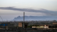 Smoke rises from the airport of Port Sudan following reported attacks early on May 4, 2025. (Photo by AFP)
