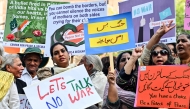 Photo used for representational purposes. Members of civil society take part in a peace rally in Lahore on May 6, 2025. Photo by Arif ALI / AFP.