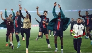PSG's players celebrate their victory at the end of the UEFA Champions League semi-final second leg football match in Paris, on May 7, 2025. (Photo by Franck Fife / AFP)