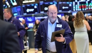Traders work on the floor of the New York Stock Exchange during morning trading on May 07, 2025 in New York City. (Photo by Michael M. Santiago / Getty Images via AFP)