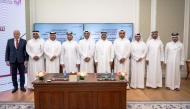 Aqarat Chairman Eng. Khalid bin Ahmed Al-Obaidli with other officials during the signing ceremony.