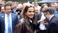 Qatar's Sheikha Al Mayassa bint Hamad bin Khalifa Al-Thani attends a ceremony marking Qatar's first official participation in the Venice Architecture Biennale on May 8, 2025. (Photo by Patrick Baz / Qatar Pavillon / AFP)