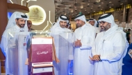 Minister of Culture H E Sheikh Abdulrahman bin Hamad Al Thani and Minister of Justice and Minister of State for Cabinet Affairs H E Ibrahim bin Ali Al Mohannadi touring the Doha International Book Fair yesterday, which is being held under the theme ‘From Engraving to Writing.’