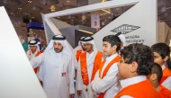 Students visit MECC pavilion at Doha International Book Fair.