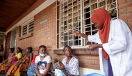 Pilirani Wanja, a clinician at Ndirande Health Centre, demonstrates to clients how to take the cholera vaccine in response to the latest cholera outbreak in Blantyre, Malawi, November 16, 2022. File Photo / Reuters

