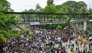Bangladesh Nationalist Party (BNP) supporters gather near the chief adviser's residence in Dhaka on May 21, 2025, demanding BNP's Hossain as the capital's mayor. (Photo by Munir Uz Zaman / AFP)