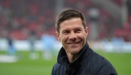 (Files) Bayer Leverkusen's Spanish head coach Xabi Alonso arrives prior to the German first division Bundesliga football match on March 28, 2025. (Photo by Pau Barrena / AFP) /