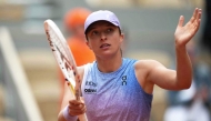 Poland's Iga Swiatek celebrates after winning against Slovakia痴 Rebecca Sramkova at the end of their women's singles match on day 2 of the French Open tennis tournament on Court Philippe-Chatrier at the Roland-Garros Complex in Paris on May 26, 2025. (Photo by Dimitar DILKOFF / AFP)
