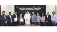Jumbo Center for Devices and Security Services officials with the certifications during the ceremony.  
