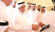 Minister of Awqaf and Islamic Affairs H E Ghanem bin Shaheen bin Ghanem Al Ghanim with other officials inaugurating the project.