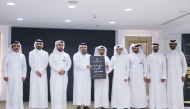 Undersecretary of the Ministry of Awqaf and Islamic Affairs H E Dr. Sheikh Khalid bin Mohammed bin Ghanem Al Thani (fourth left) with other officials at the event. 
