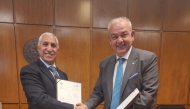 UDST President Dr. Salem Al-Naemi (left) and NTUA Rector Professor Ioannis K Chatjigeorgiou during signing of the agreement.  