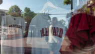 Harvard merchandise hangs in a window on May 28, 2025 in Cambridge, Massachusetts. (Photo by SPENCER PLATT / GETTY IMAGES NORTH AMERICA / Getty Images via AFP)