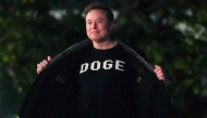(Files) Elon Musk shows off a shirt that says 