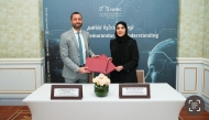 NHRC chairperson H E Maryam bint Abdullah Al-Attiyah and Head of the ILO Project Office in Qatar, Max Tunon at MoU signing.