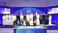 Chairman of Media City Qatar and the Organising Committee of the Forum, Sheikh Dr. Abdulla bin Ali Al Thani, and CEO of Bloomberg Media, Karen Saltser, with officials during the conclusion of Qatar Economic Forum 2025.
