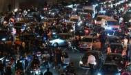 Paris Saint-Germain (PSG) supporters and motorists halt on the Peripherique between Porte Maillot and Porte Champerret in Paris early June 1, 2025. (Photo by LOU BENOIST / AFP)
