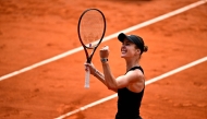 Ukraine's Elina Svitolina celebrates after winning against Italy's Jasmine Paolini at the Roland-Garros Complex in Paris on June 1, 2025. (Photo by Julien De Rosa / AFP)