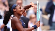 US Coco Gauff celebrates after winning against Russia's Ekaterina Alexandrova on day 9 of the French Open tennis tournament on Court Philippe-Chatrier at the Roland-Garros Complex in Paris on June 2, 2025. (Photo by Anne-Christine POUJOULAT / AFP)