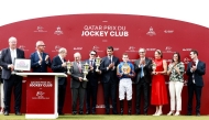 QREC Chairman Hamad bin Abdulrahman Al-Attiyah presented trophies to the winners of QREC-sponsored Qatar Prix du Jockey Club. RIGHT: Camille Pissarro under Ryan Moore (left) claims victory.