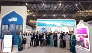 Representatives and partners at Visit Qatar pavilion at ITB China 2025.