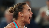 Belarus' Aryna Sabalenka reacts to a point against Poland's Iga Swiatek during their women's singles semi-final match on day 12 of the French Open tennis tournament on Court Philippe-Chatrier at the Roland-Garros Complex in Paris on June 5, 2025. (Photo by Alain JOCARD / AFP)
