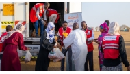 QRCS officials distributing sacrificial meat as part of the ‘Udhiya is Blessing’ project in Sudan.