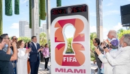 Beau Ferrari and Marc Anthony unveil the FIFA World Cup Miami Countdown Clock during the FIFA World Cup One Year Out Celebration at Perez Art Museum Miami on June 11, 2025 in Miami, Florida. (Photo by Ivan Apfel/Getty Images via AFP)