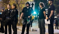 LAPD officers detain protesters near City Hall as demonstrations continue after a series of immigration raids began on June 11, 2025 in Los Angeles, California. Mario Tama/Getty Images/AFP 